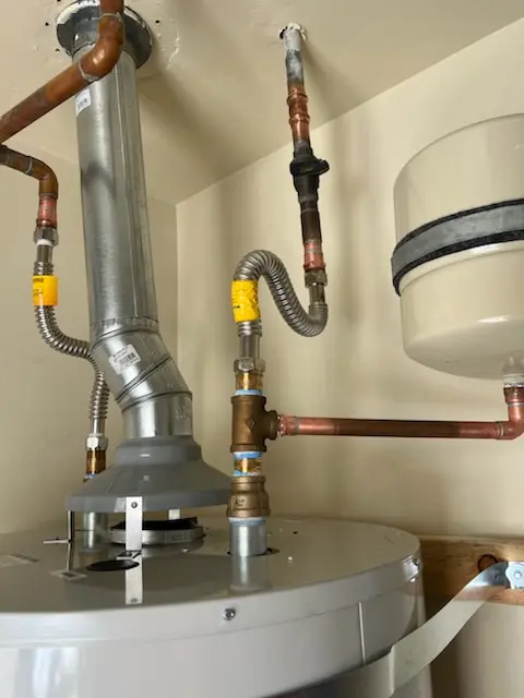 Water heater installation and plumbing repair in Pepperidge